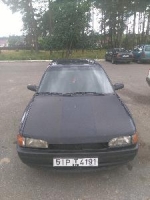 Mazda 323 1992 года в городе Смолевичиский р-н, зелёный бор фото 1